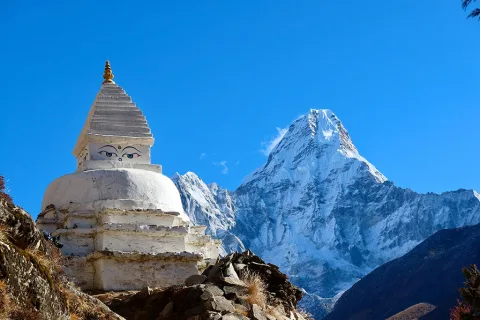 Buddhist with Ama Dablam View
